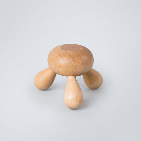 Main de massage en bois