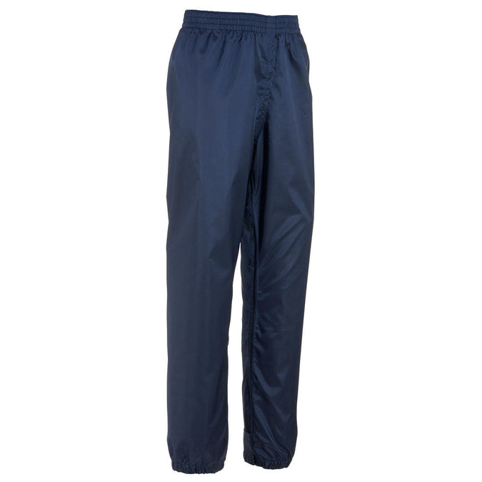 





Sur-pantalon imperméable de randonnée - MH100 bleu marine - enfant 2-6 ANS, photo 1 of 6